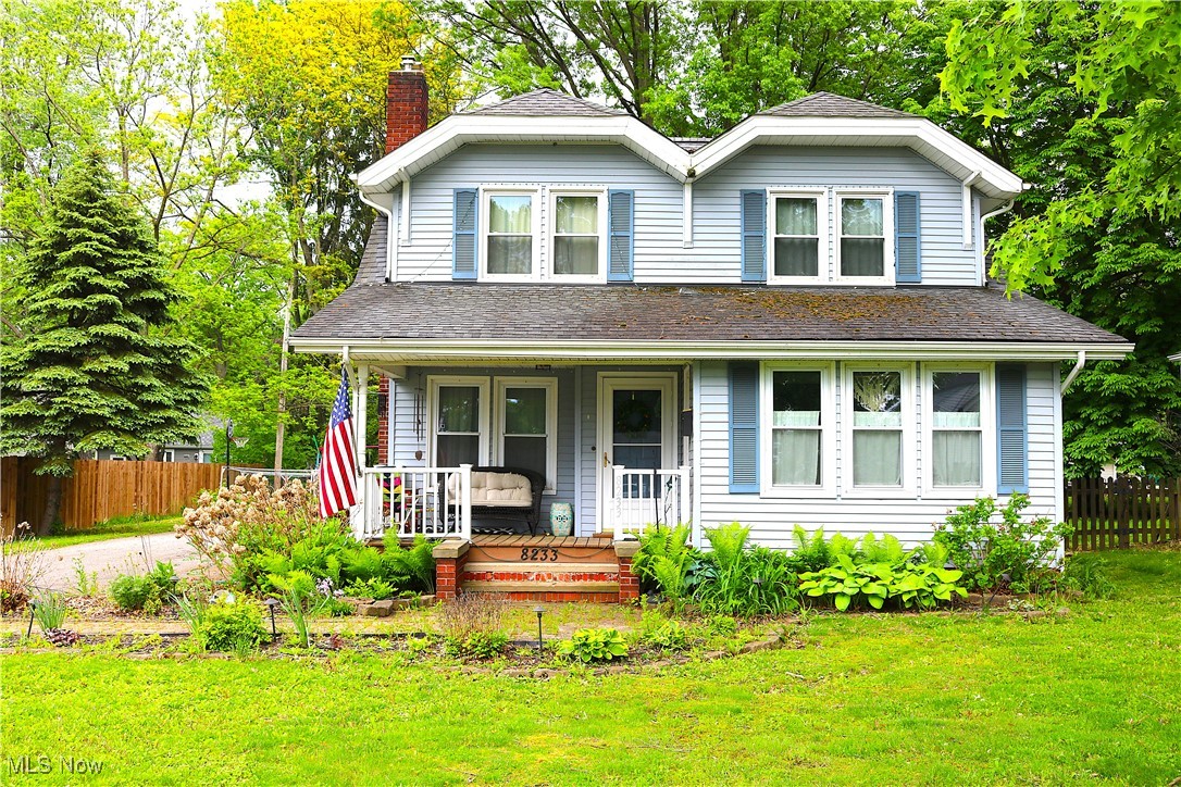 8233 Midland Road Mentor, OH 44060 - Photo 1 of 18 View of front of home featuring covered porch and a chimney