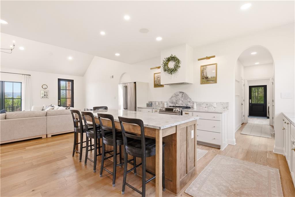 315 Stewarton Road Mill Run, PA 15464 - Photo 20 of 47 a kitchen with a table and chairs in it