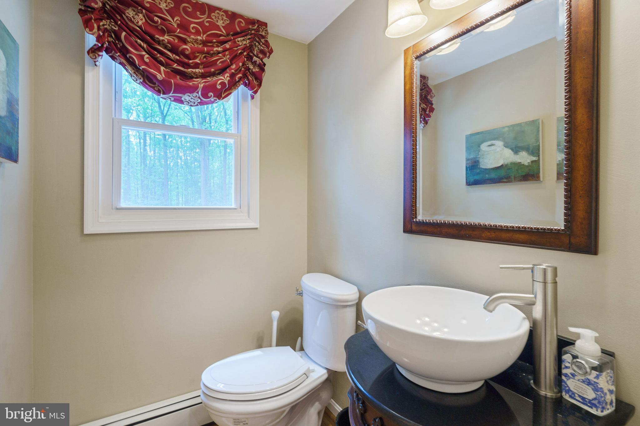 280 Peck Road Downingtown, PA 19335 - Photo 22 of 24 with powder room and driveway/garage access doors.