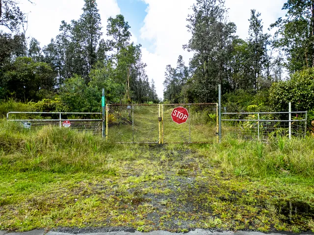 a view of a golf course with a lake view