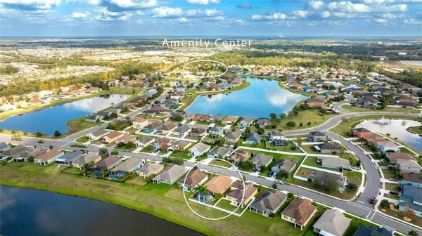 a view of a city with an ocean