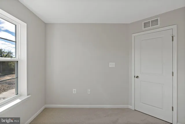 an empty room with a window