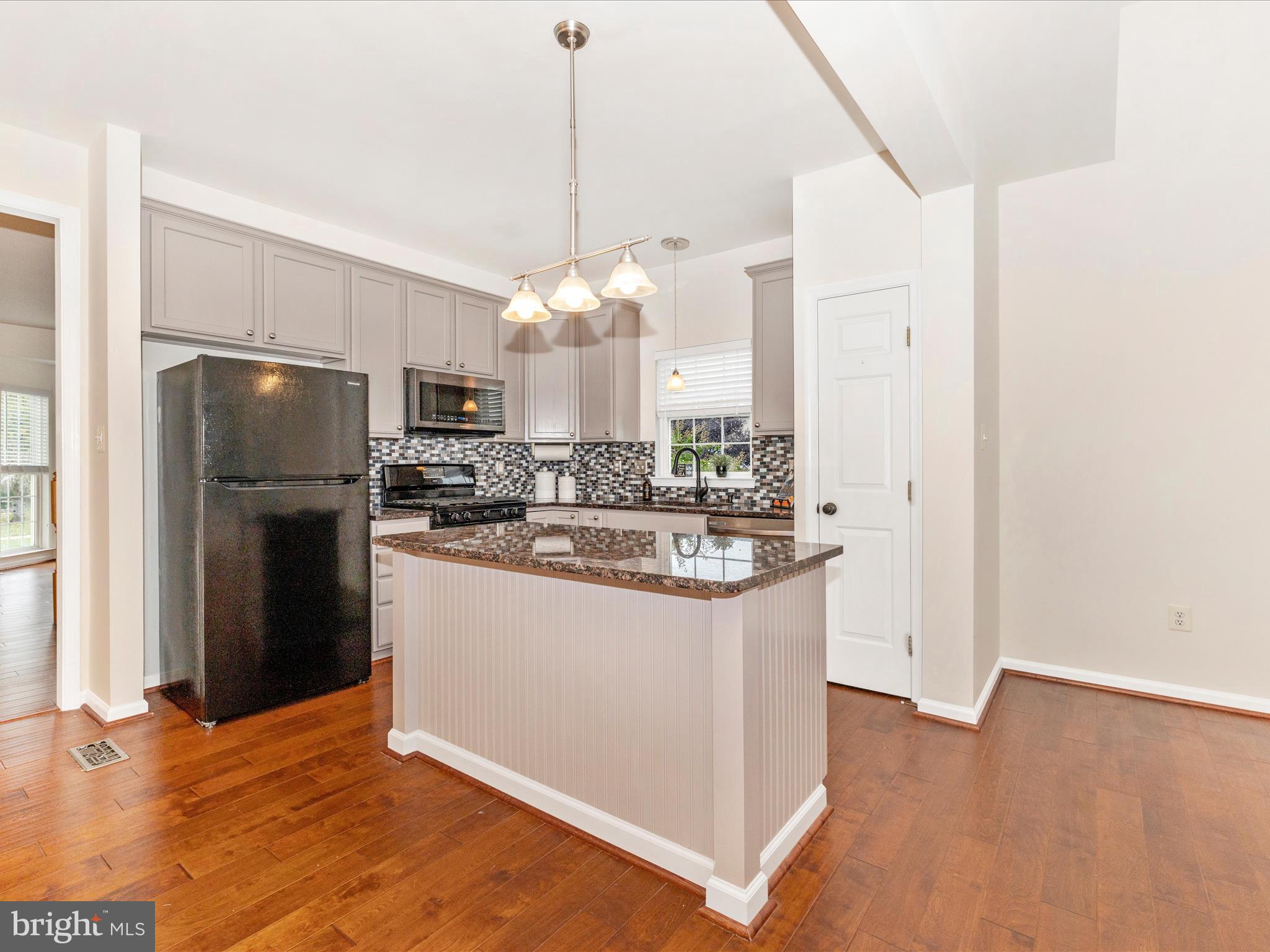 1801 Free Terrace Frederick, MD 21702 - Photo 13 of 62 a kitchen with stainless steel appliances granite countertop a refrigerator a oven a sink and a refrigerator