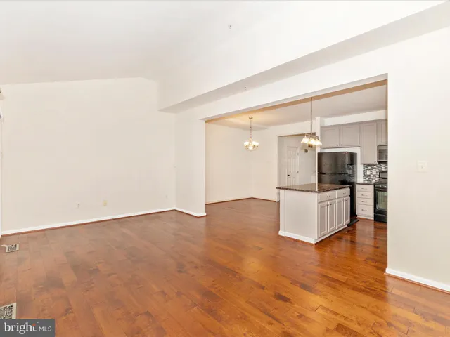 a bedroom with bed and a window