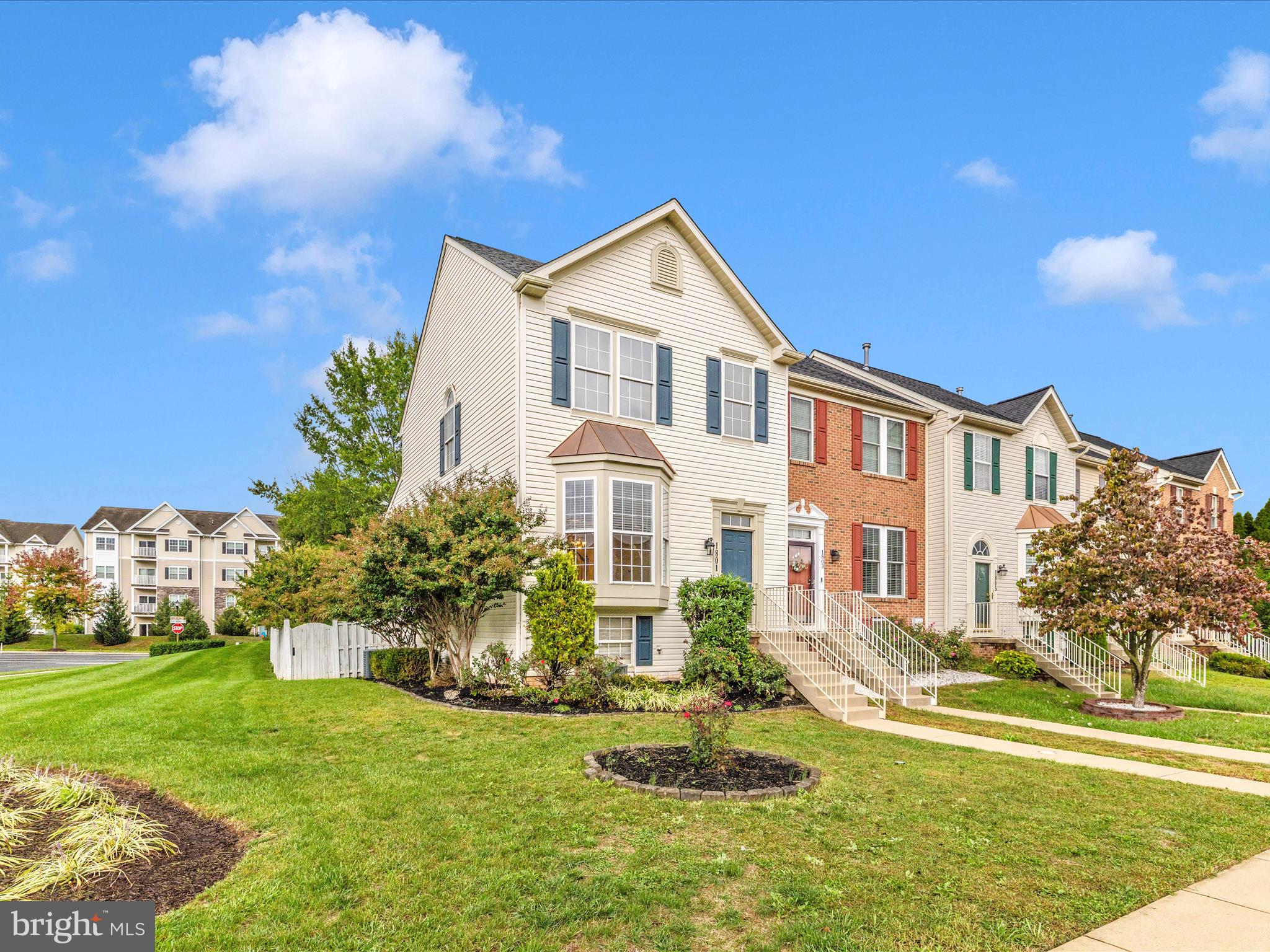 1801 Free Terrace Frederick, MD 21702 - Photo 2 of 62 a front view of a house with a yard table and chairs