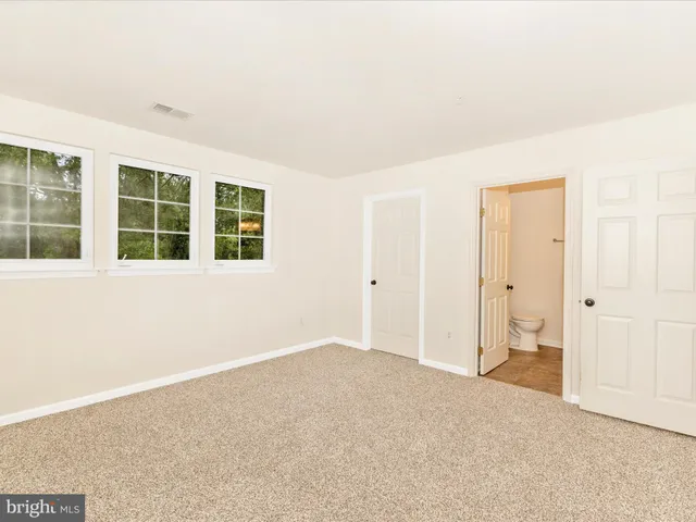 a view of small space with racks on the wall