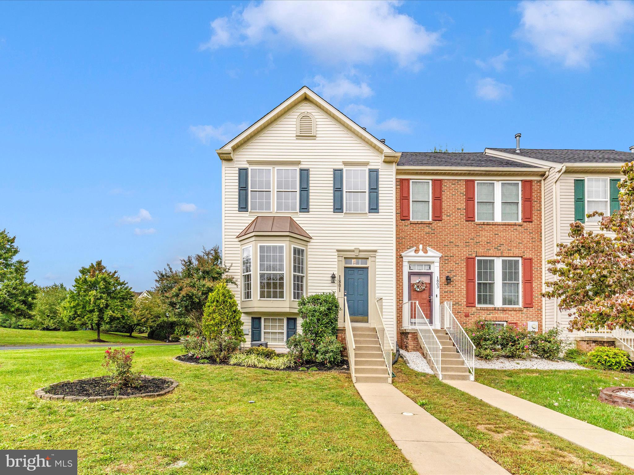 1801 Free Terrace Frederick, MD 21702 - Photo 43 of 62 a front view of a house with a yard