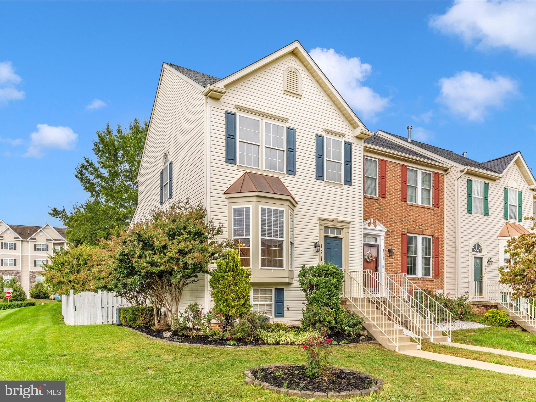 1801 Free Terrace Frederick, MD 21702 - Photo 44 of 62 a front view of a house with a yard