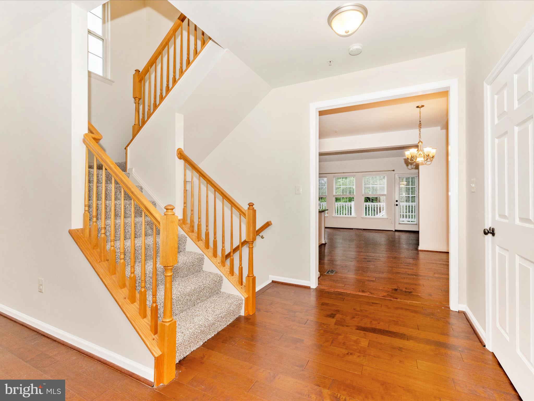 1801 Free Terrace Frederick, MD 21702 - Photo 6 of 62 a view of entryway and hall with wooden floor