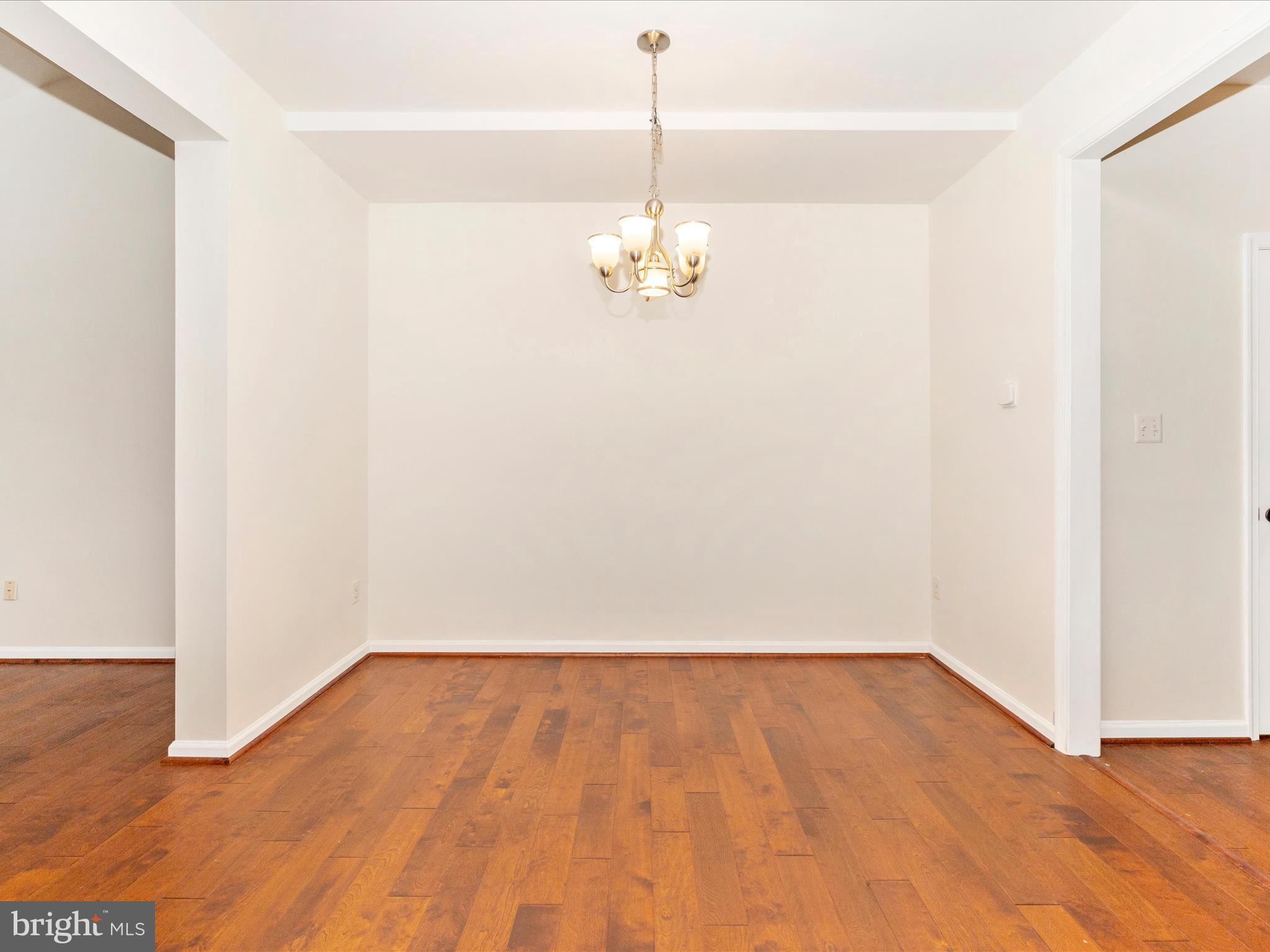 1801 Free Terrace Frederick, MD 21702 - Photo 8 of 62 a view of a room with wooden floor and ceiling fan