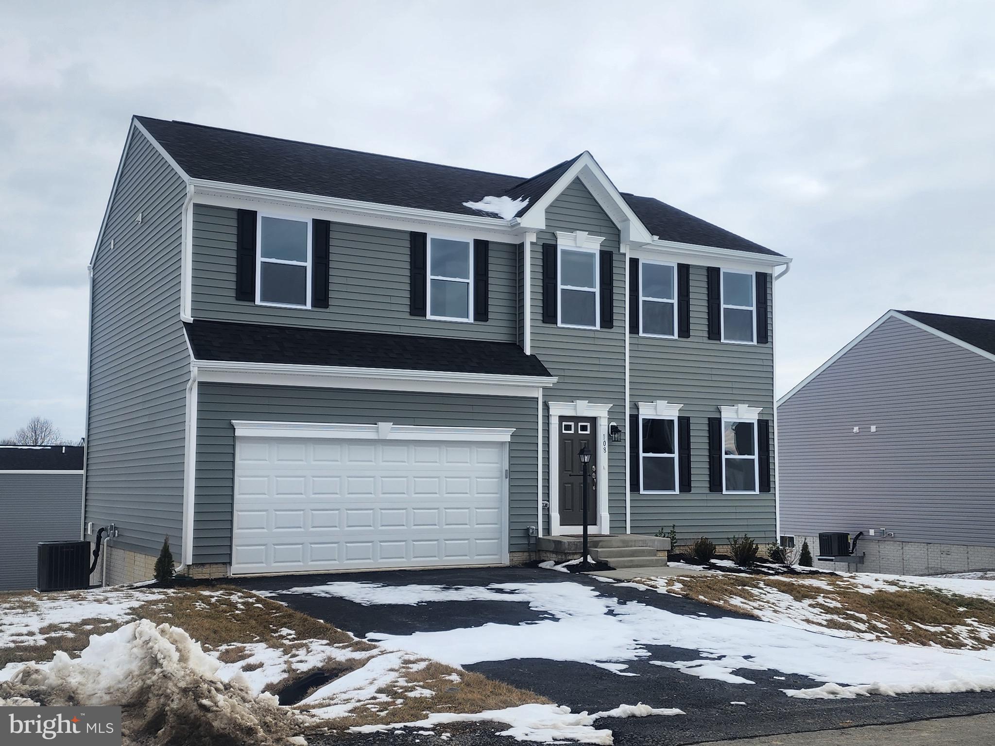 108 Ramshorn Road Inwood, WV 25428 - Photo 1 of 18 a front view of a house with a yard