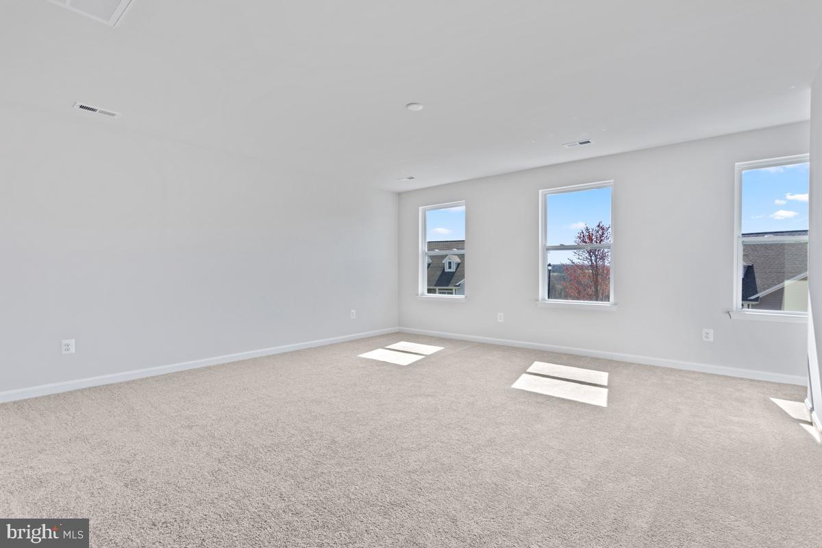 108 Ramshorn Road Inwood, WV 25428 - Photo 15 of 18 a view of empty room with windows