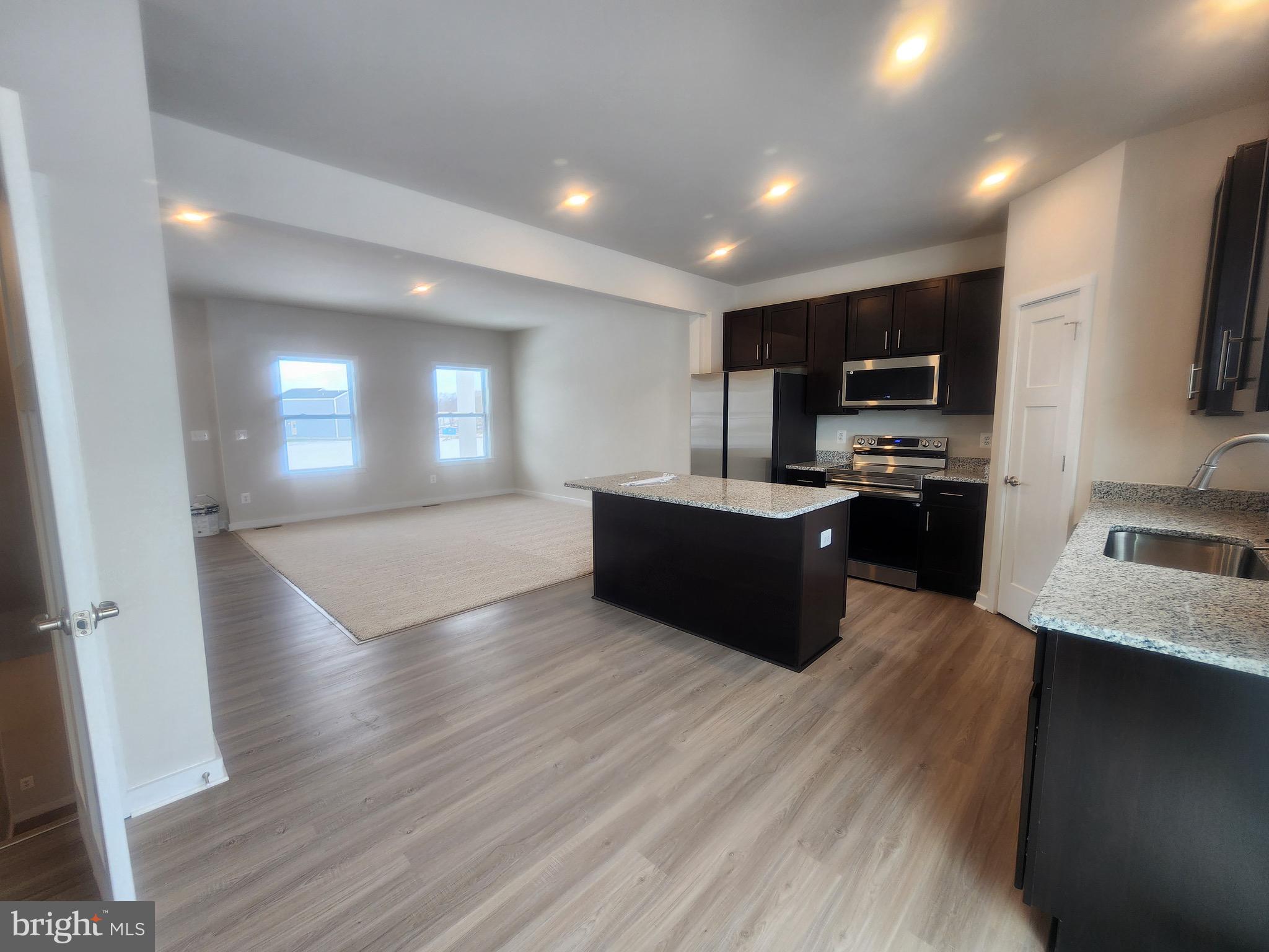 108 Ramshorn Road Inwood, WV 25428 - Photo 4 of 18 a large kitchen with stainless steel appliances lots of counter top space