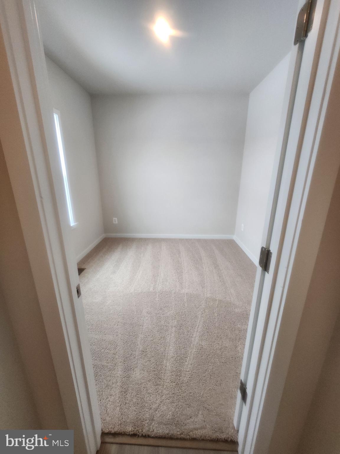 108 Ramshorn Road Inwood, WV 25428 - Photo 5 of 18 view of room with window