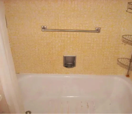 a view of a lake with a yard