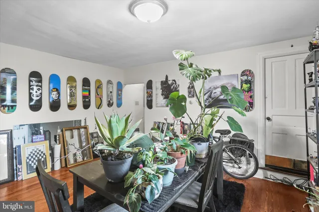 a kitchen with a refrigerator and a stove