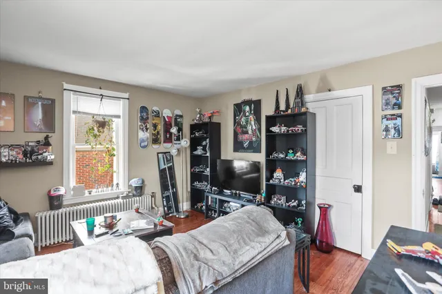 a view of a backyard with a garden and trees