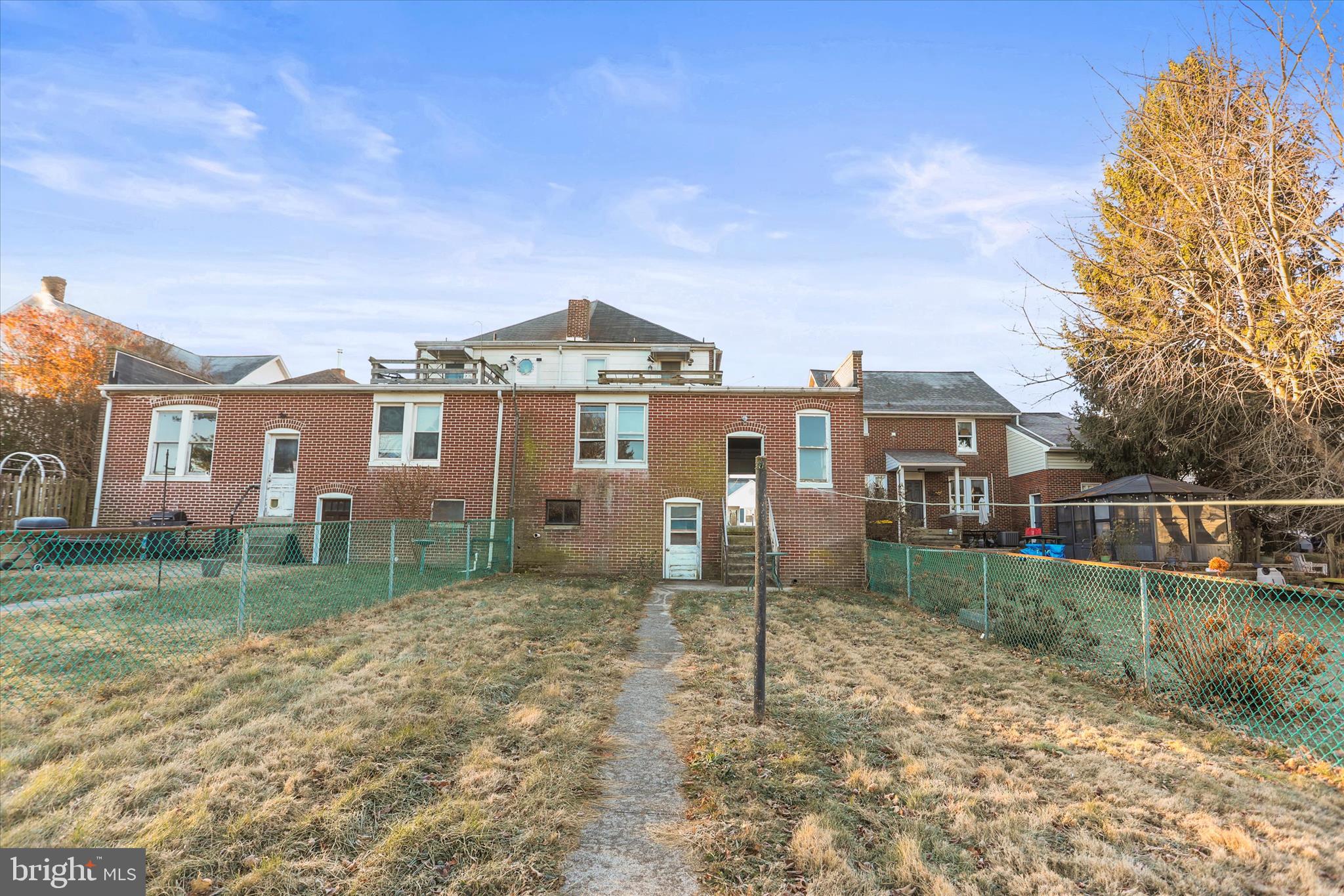 530 Baer Avenue Hanover, PA 17331 - Photo 47 of 55 a view of a yard in front of a brick house with large windows