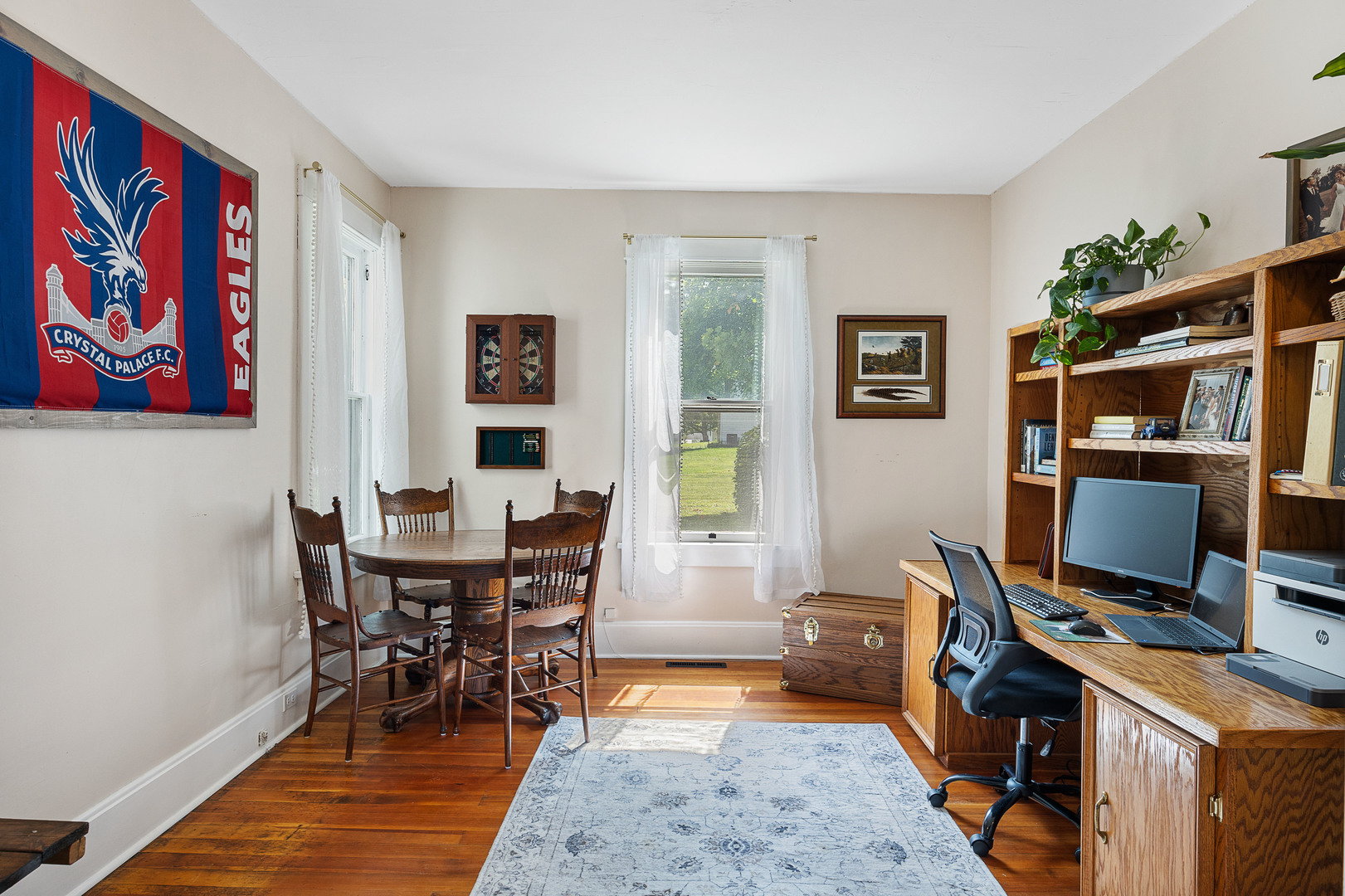 208 North East Street Lexington, IL 61753 - Photo 15 of 38 a view of a workspace with furniture and a rug