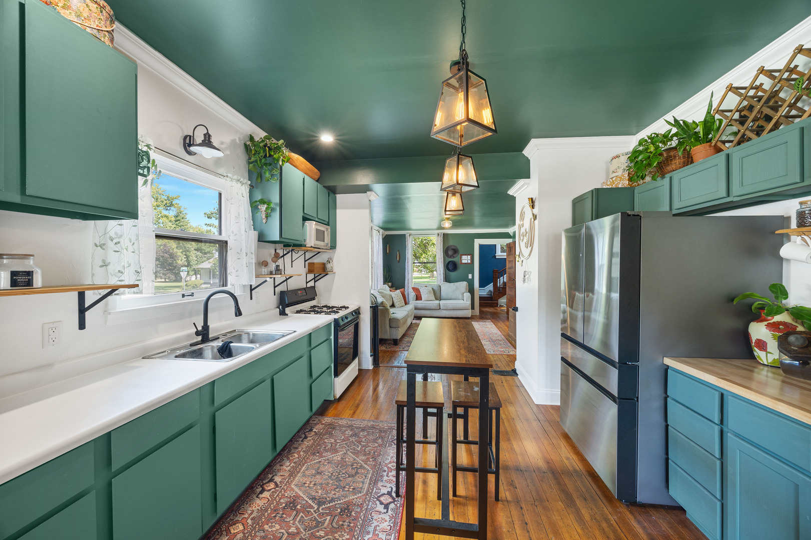 208 North East Street Lexington, IL 61753 - Photo 6 of 38 a kitchen with granite countertop a sink appliances and cabinets