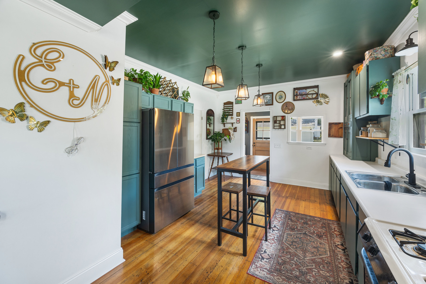 208 North East Street Lexington, IL 61753 - Photo 9 of 38 a kitchen with stainless steel appliances granite countertop a refrigerator and a stove top oven