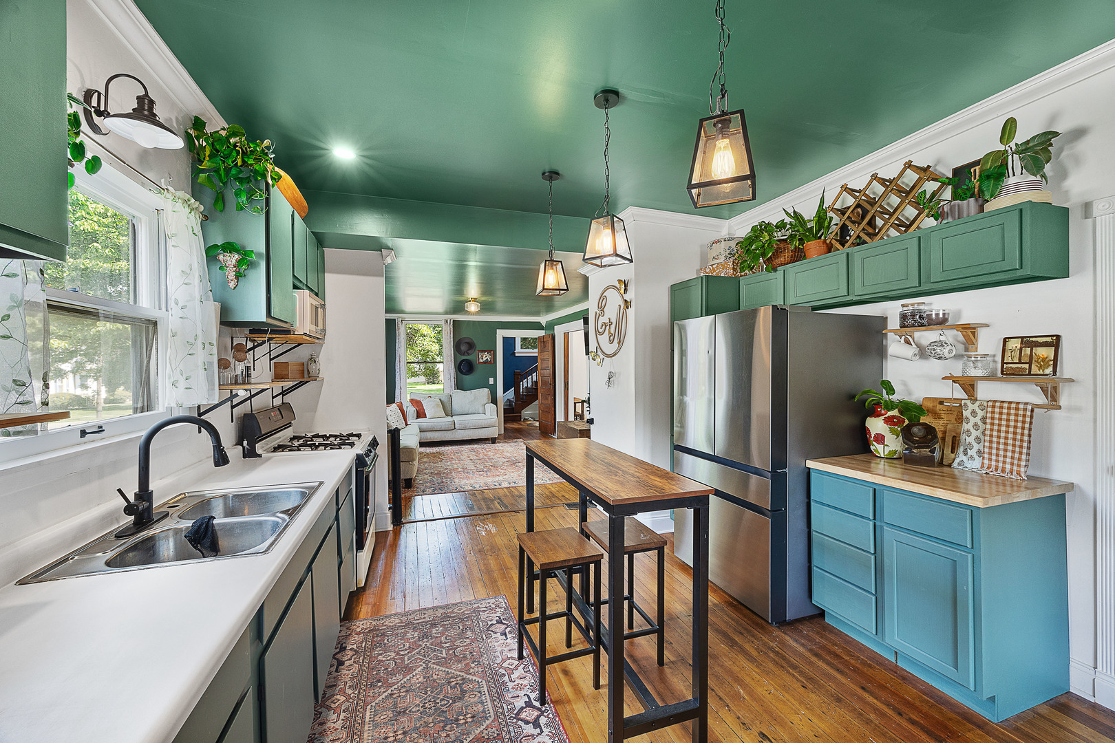 208 North East Street Lexington, IL 61753 - Photo 10 of 38 a kitchen with sink refrigerator and cabinets