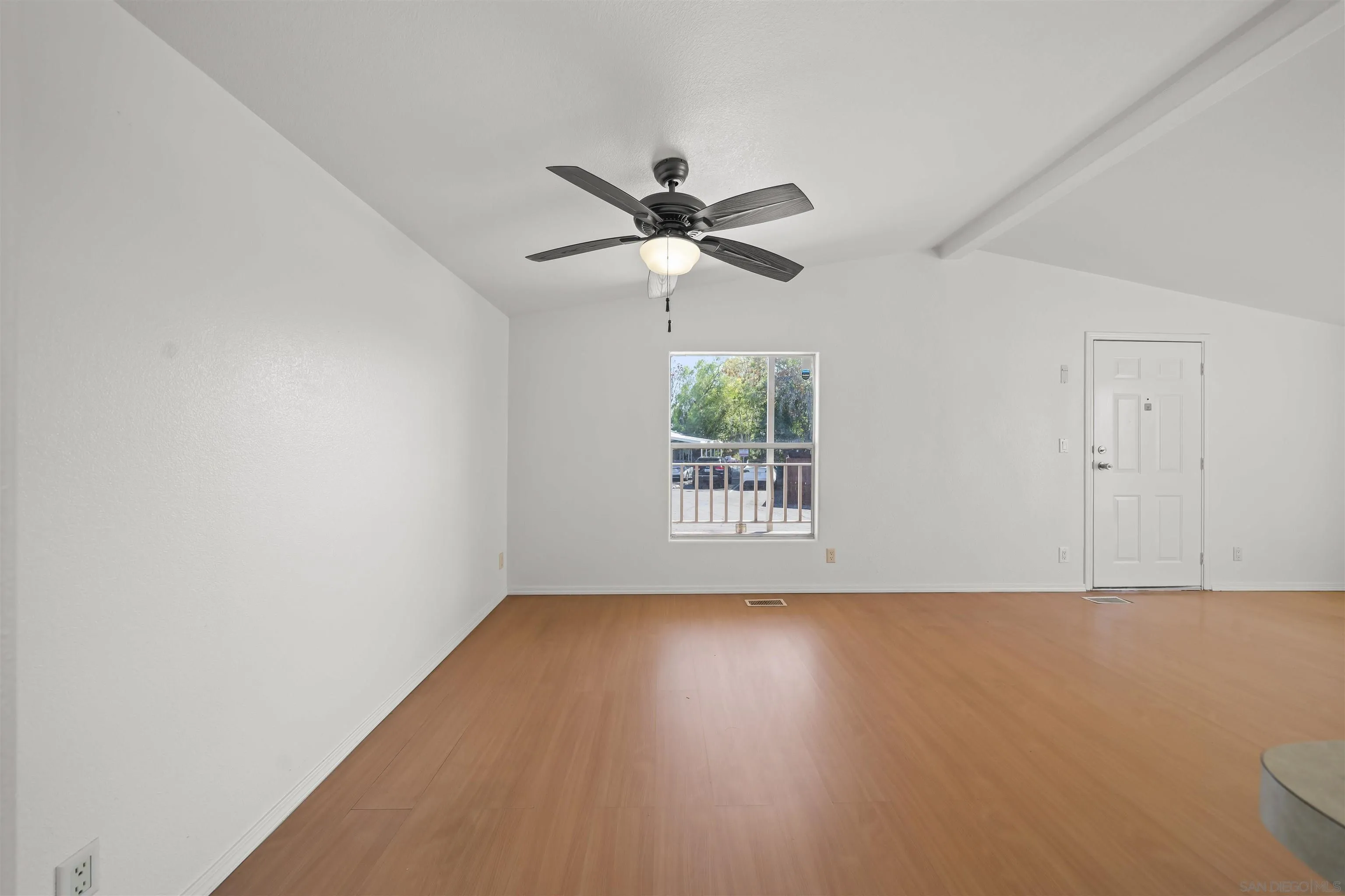9902 Jamacha Boulevard, Unit 13 Spring Valley, CA 91977 - Photo 15 of 32 a view of an empty room with a window