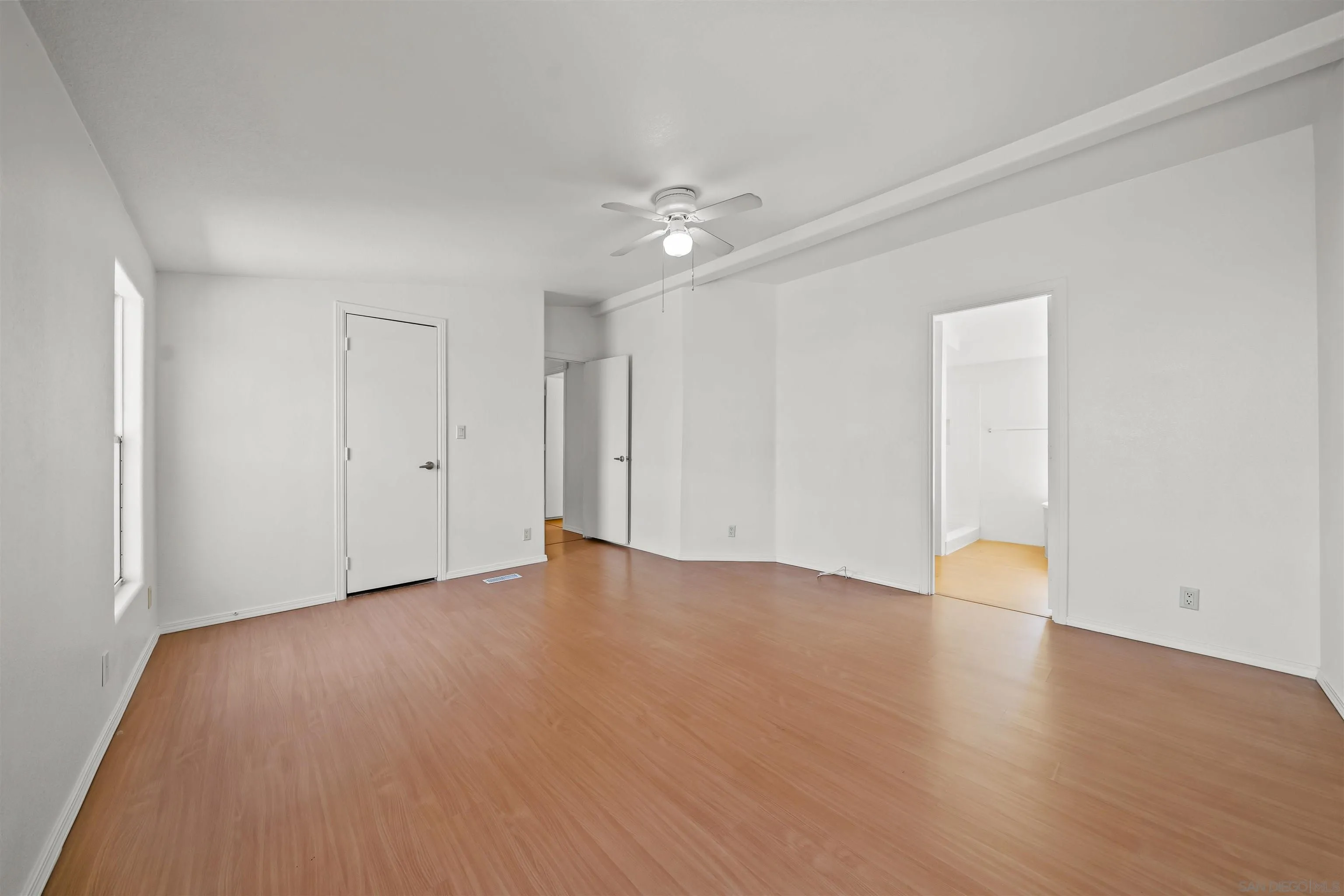 9902 Jamacha Boulevard, Unit 13 Spring Valley, CA 91977 - Photo 24 of 32 a view of an empty room with wooden floor