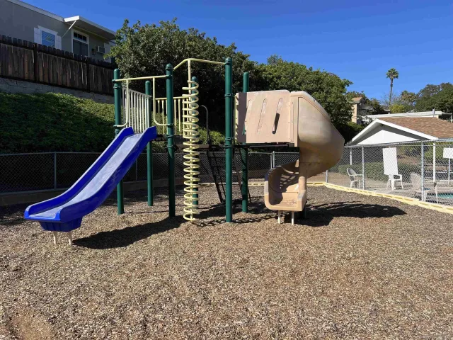 a view of a house with a park