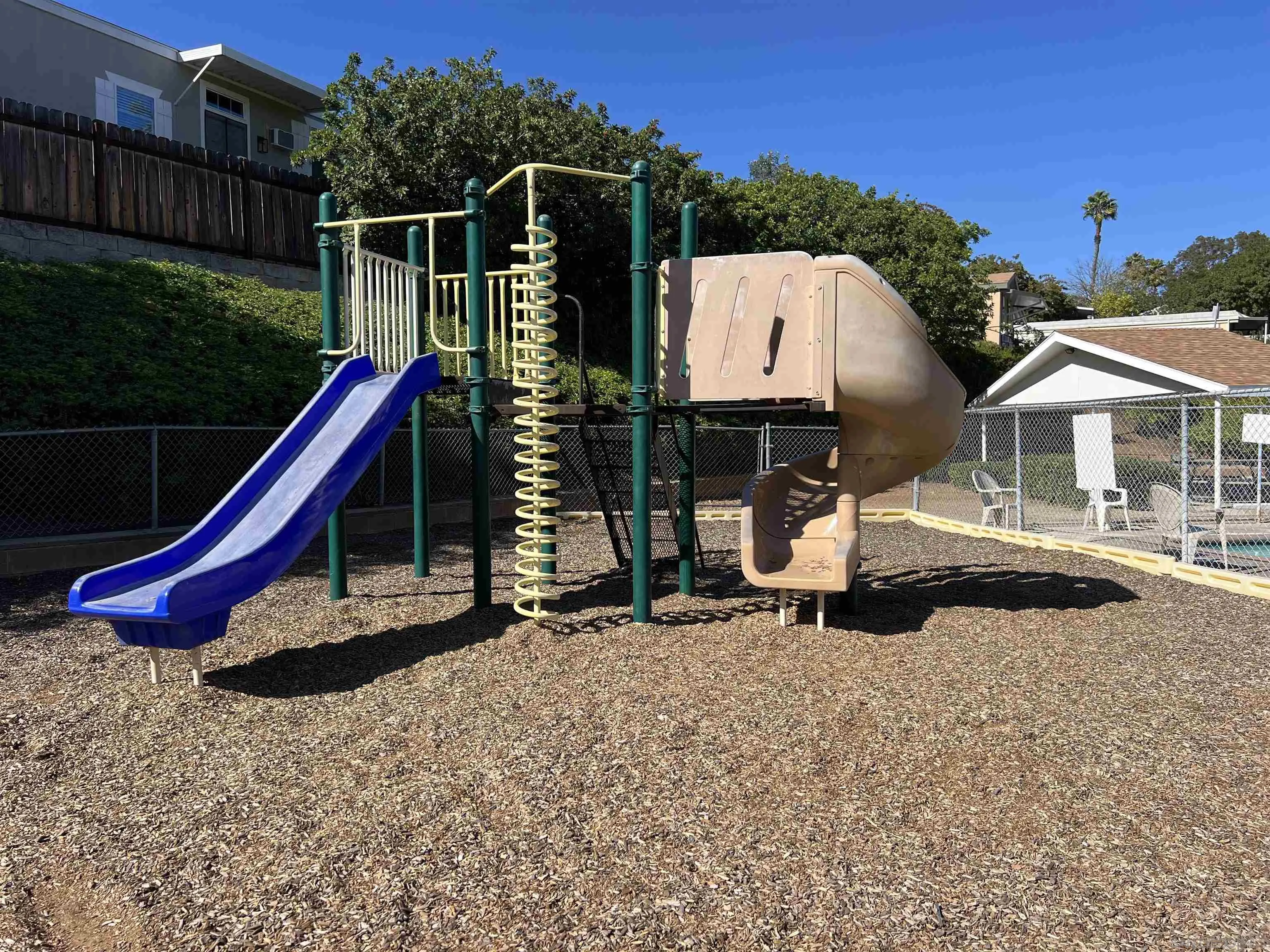 9902 Jamacha Boulevard, Unit 13 Spring Valley, CA 91977 - Photo 30 of 32 a view of a house with a park