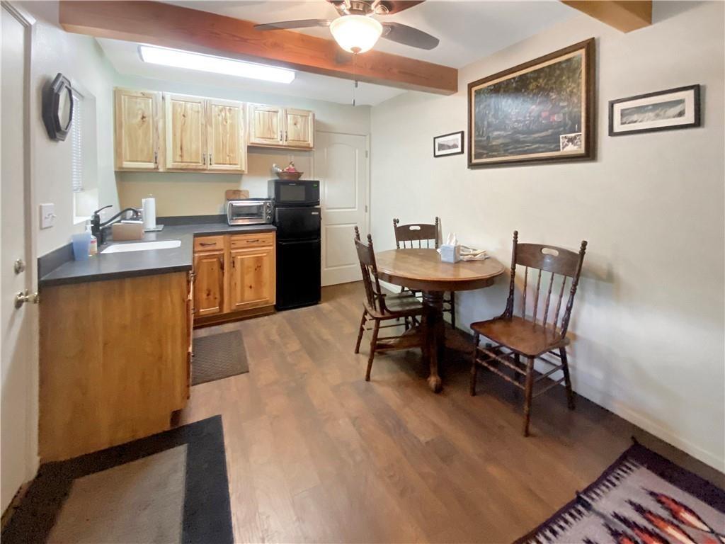 34449 Road 274 North Fork, CA 93643 - Photo 19 of 41 a view of a dining room with furniture and a kitchen