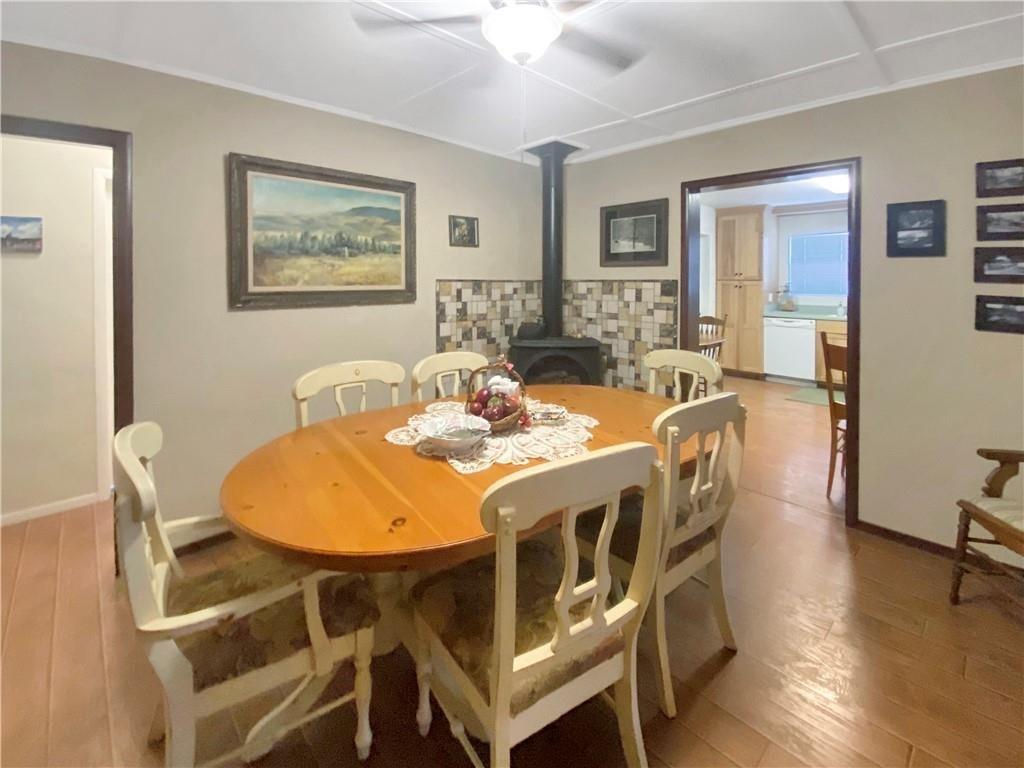34449 Road 274 North Fork, CA 93643 - Photo 26 of 41 a view of a dining room with furniture window and wooden floor