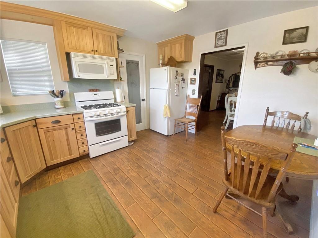 34449 Road 274 North Fork, CA 93643 - Photo 29 of 41 a kitchen with stainless steel appliances a stove a sink cabinets and a refrigerator