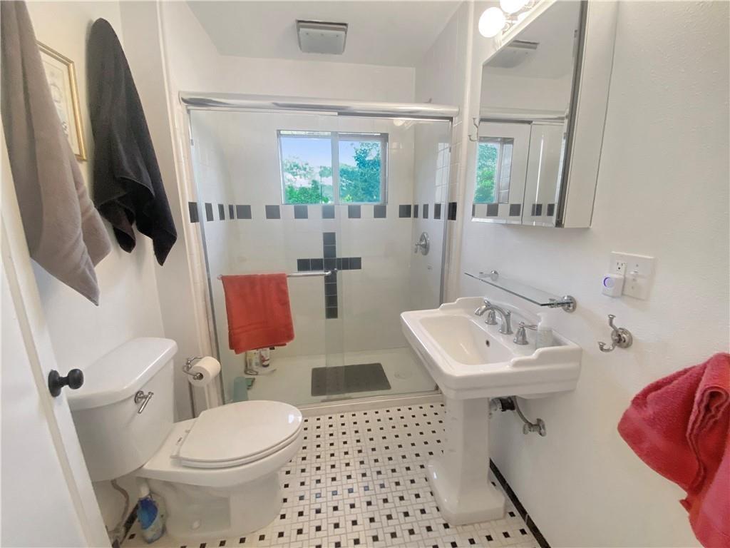 34449 Road 274 North Fork, CA 93643 - Photo 30 of 41 a bathroom with a sink toilet and mirror