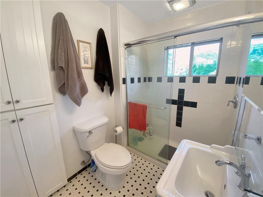 34449 Road 274 North Fork, CA 93643 - Photo 31 of 41 a bathroom with a toilet sink and mirror