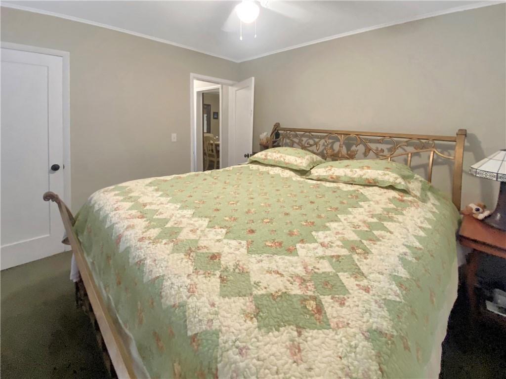 34449 Road 274 North Fork, CA 93643 - Photo 33 of 41 a bedroom with a bed and a window