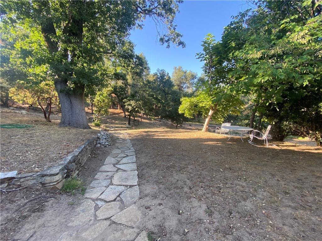 34449 Road 274 North Fork, CA 93643 - Photo 8 of 41 a view of dirt yard with a trees