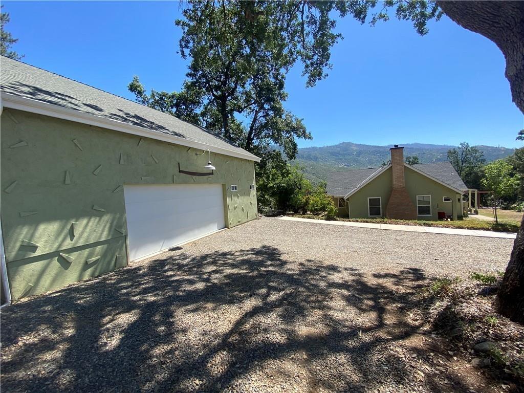 34449 Road 274 North Fork, CA 93643 - Photo 9 of 41 a pathway of a house with a yard
