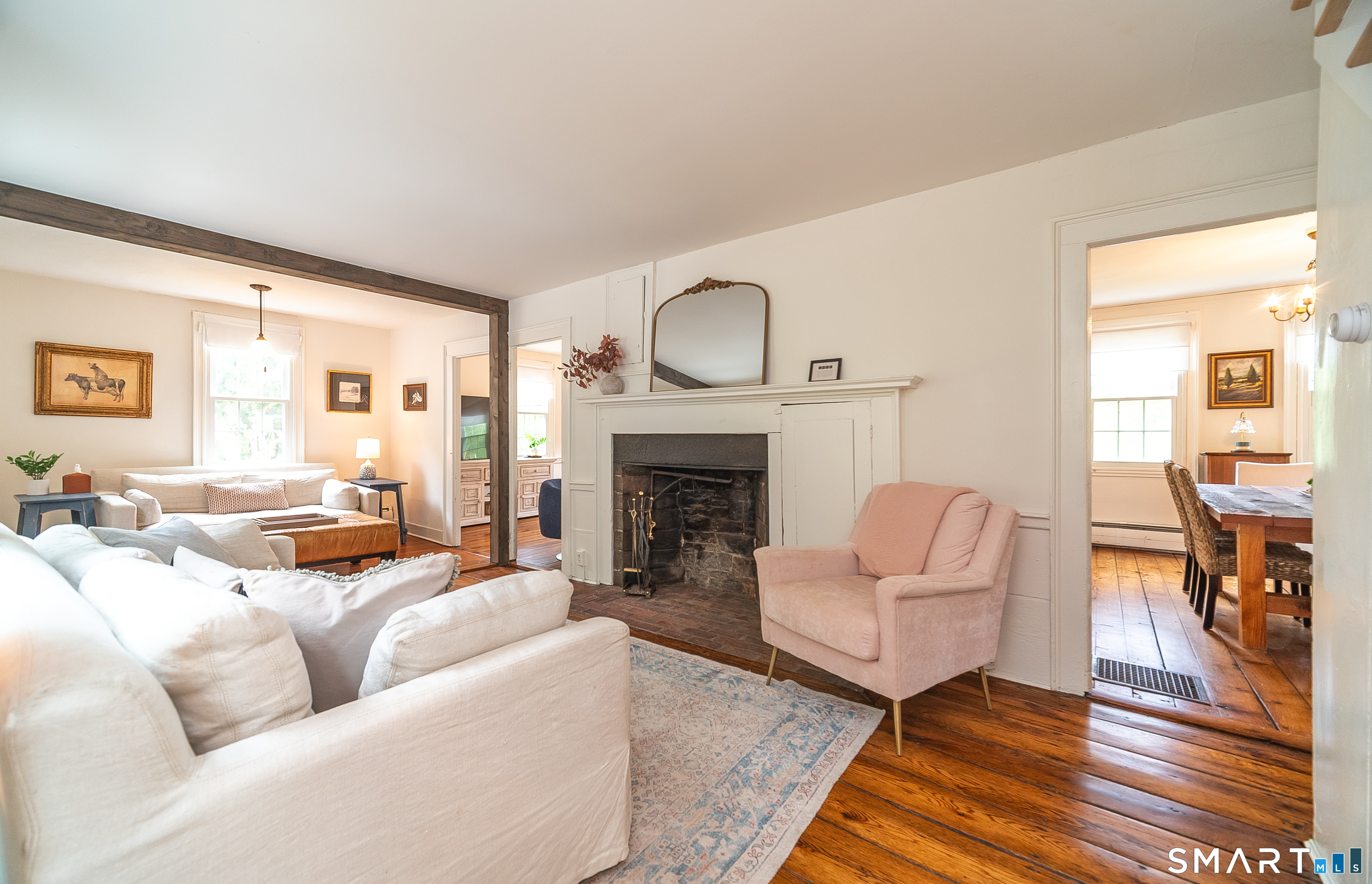 230 Killingworth Road Haddam, CT 06441 - Photo 10 of 36 a living room with furniture and a fireplace