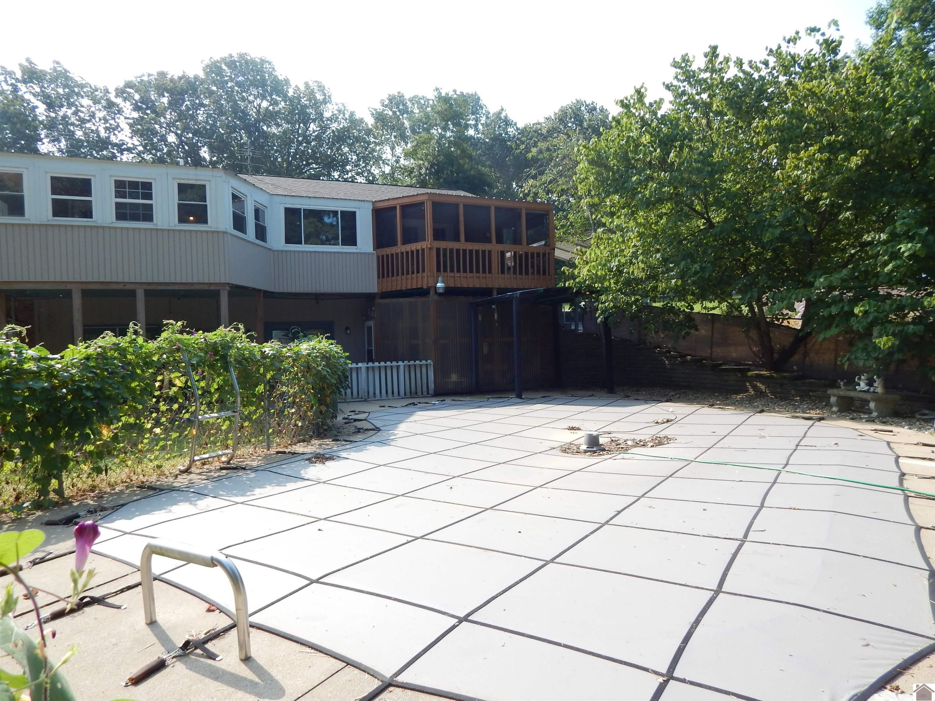 283 Delaware Road Gilbertsville, KY 42044 - Photo 26 of 35 BACK OF HOUSE WITH VIEW OF POOL