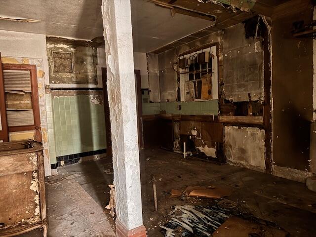 552 McKinley Street Gary, IN 46404 - Photo 10 of 14 a view of a house with a yard