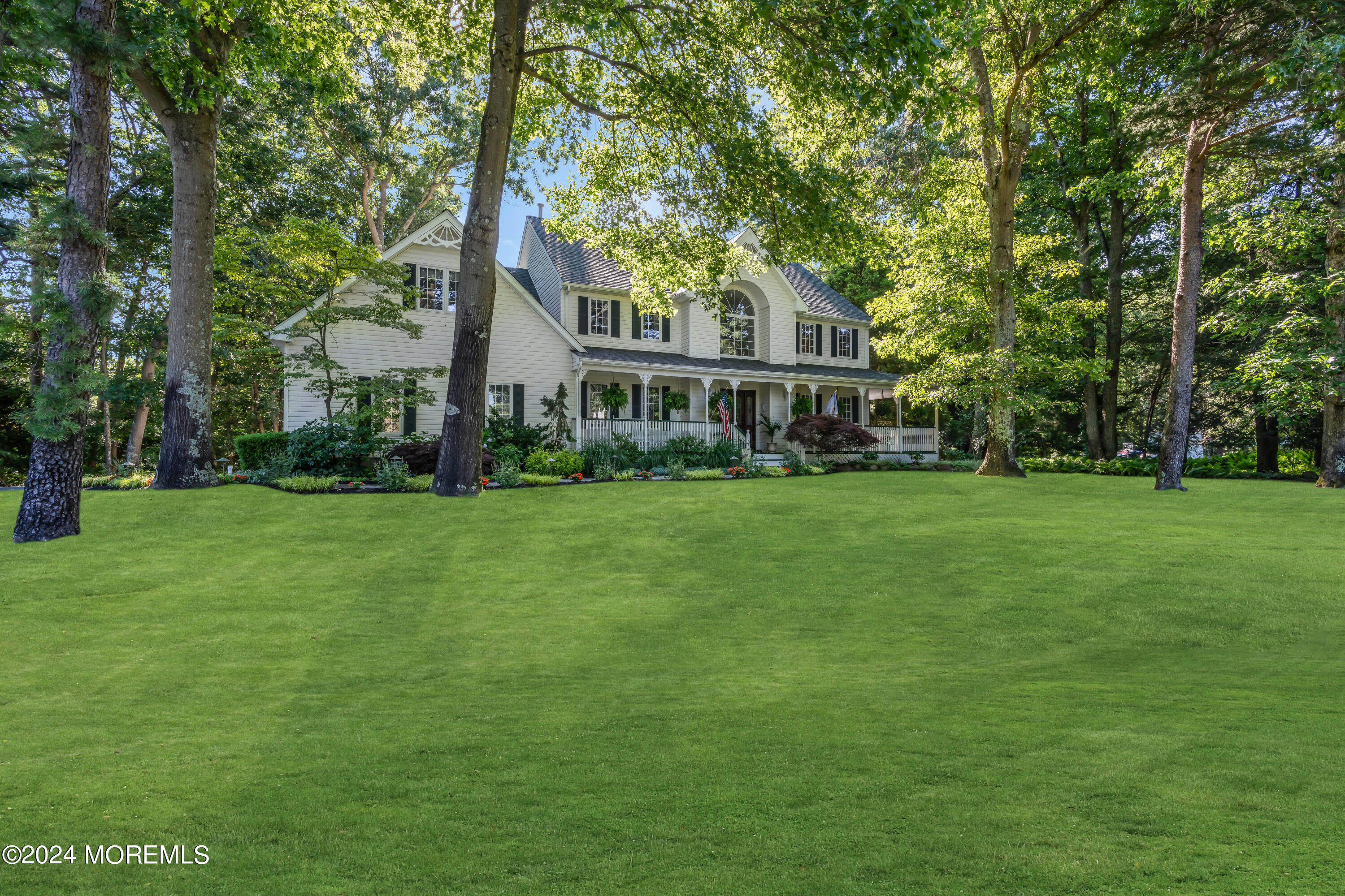 11 Dunhill Road Jackson, NJ 08527 - Photo 112 of 147 a front view of a house with garden