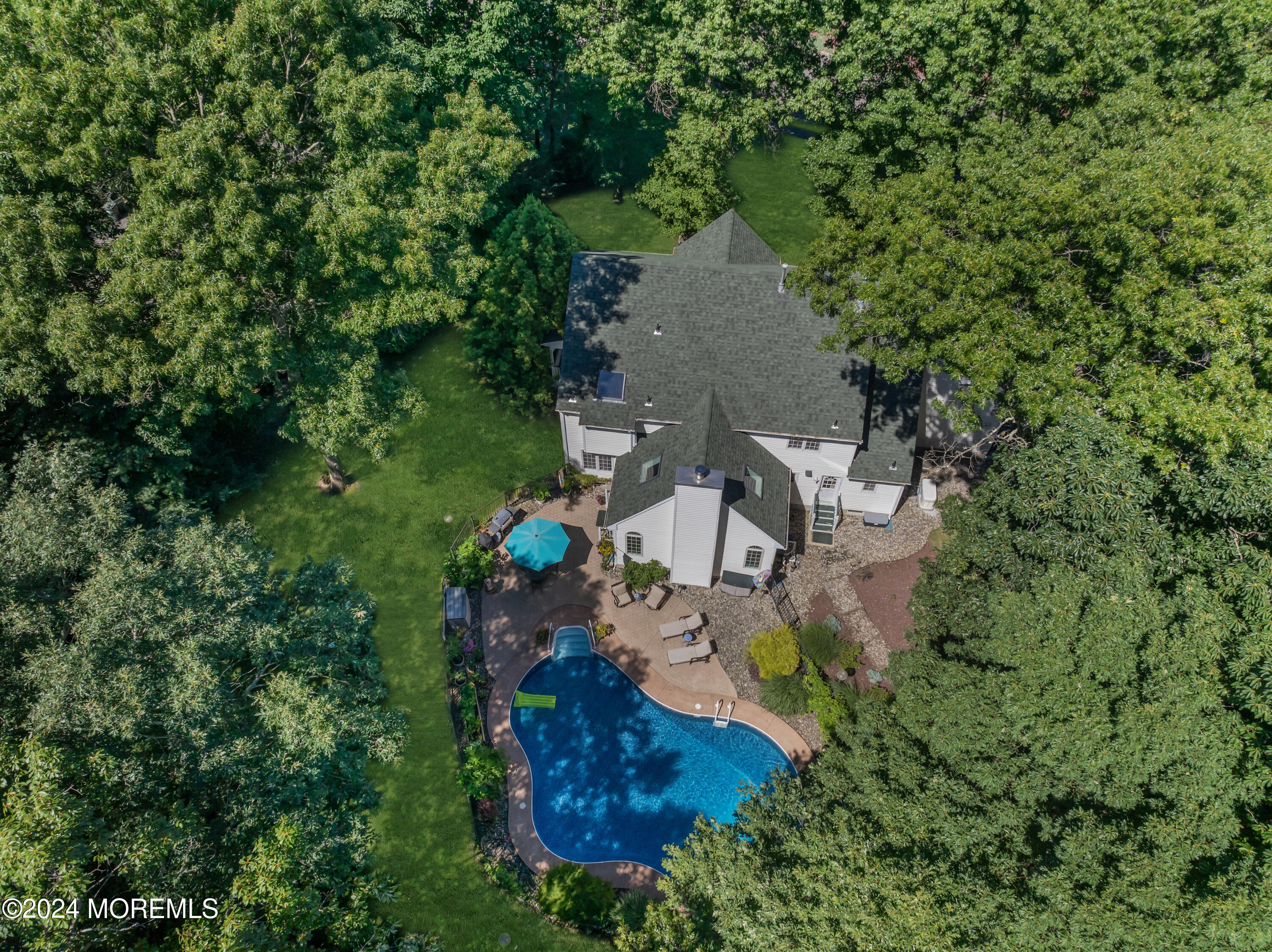 11 Dunhill Road Jackson, NJ 08527 - Photo 131 of 147 an aerial view of a house with a yard and trees all around