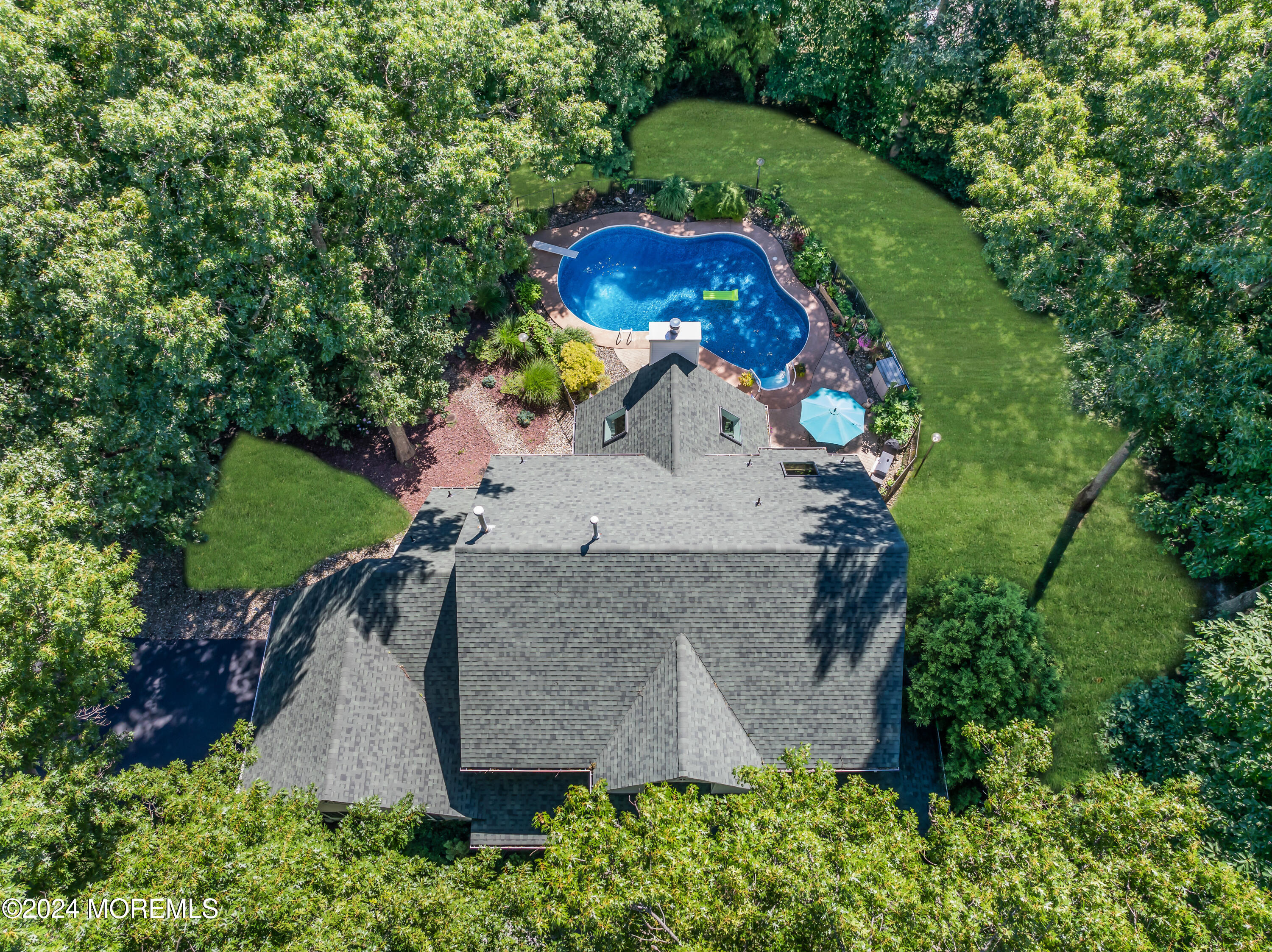 11 Dunhill Road Jackson, NJ 08527 - Photo 134 of 147 an aerial view of a house with a yard and large trees