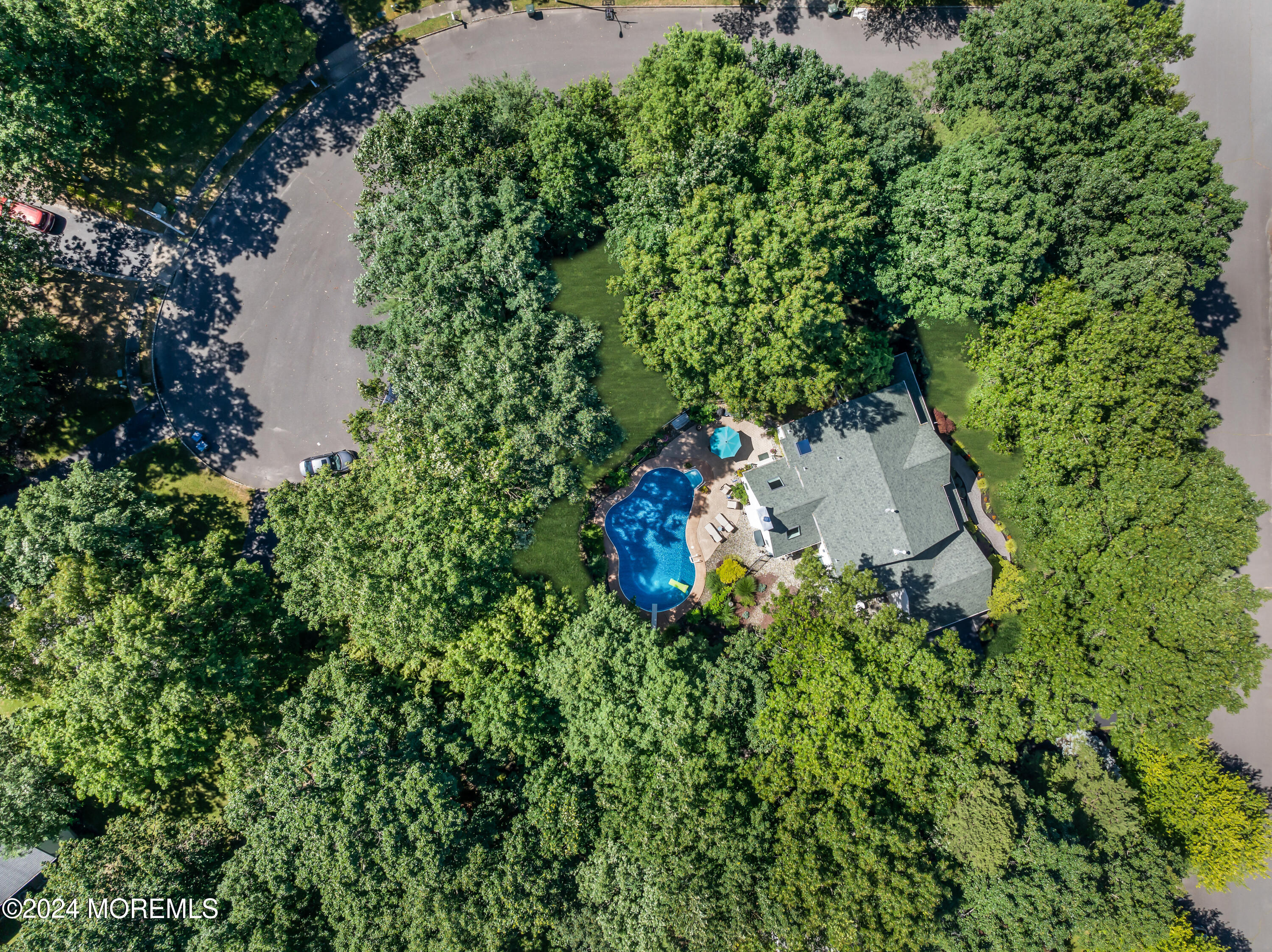 11 Dunhill Road Jackson, NJ 08527 - Photo 137 of 147 an aerial view of a house with a yard and lake view