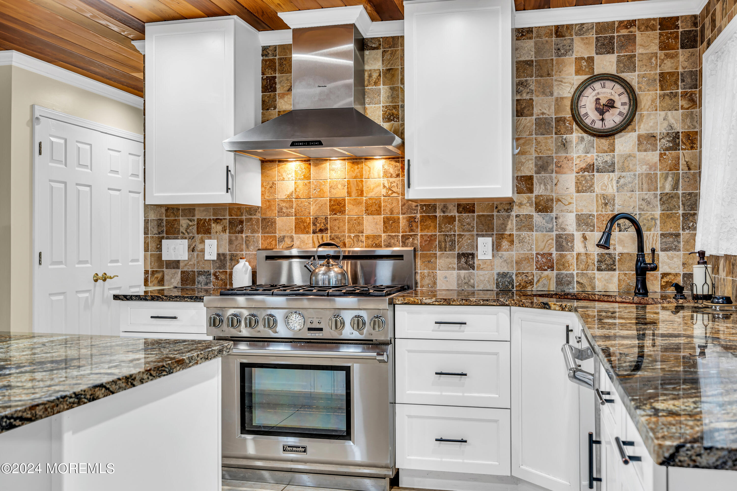 11 Dunhill Road Jackson, NJ 08527 - Photo 15 of 147 a kitchen with stainless steel appliances granite countertop a stove and a sink