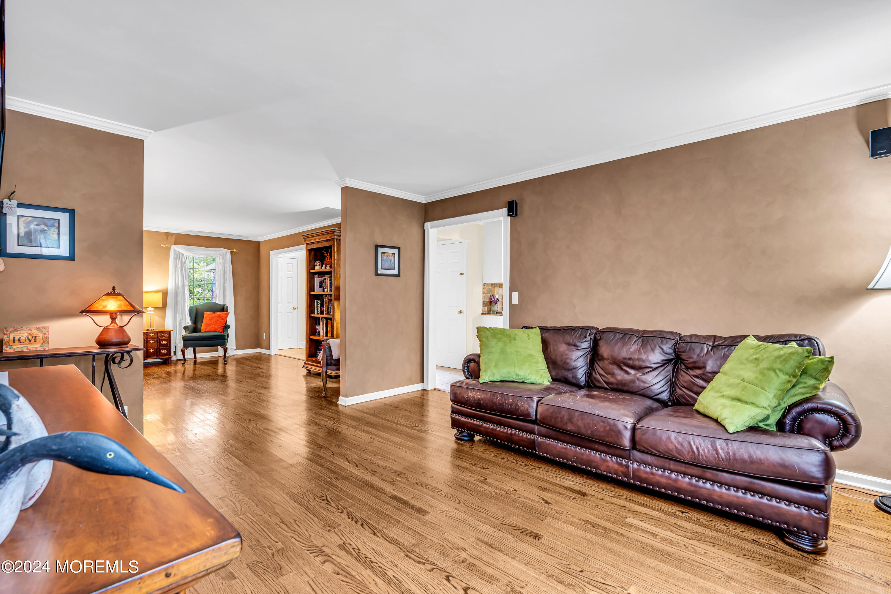 11 Dunhill Road Jackson, NJ 08527 - Photo 37 of 147 a living room with furniture and a wooden floor