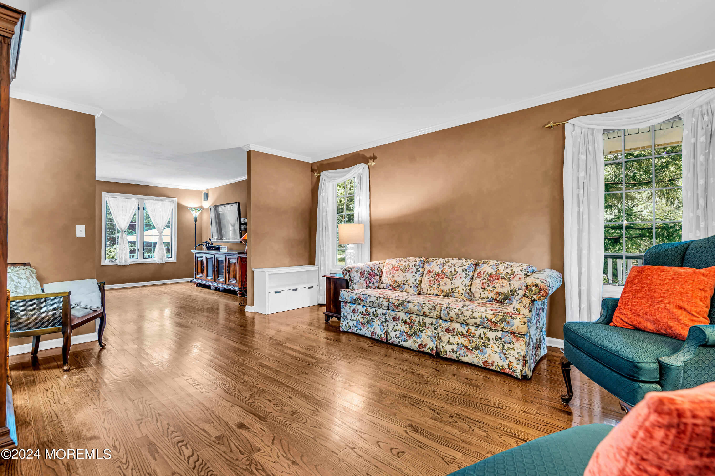 11 Dunhill Road Jackson, NJ 08527 - Photo 39 of 147 a living room with furniture and a large window