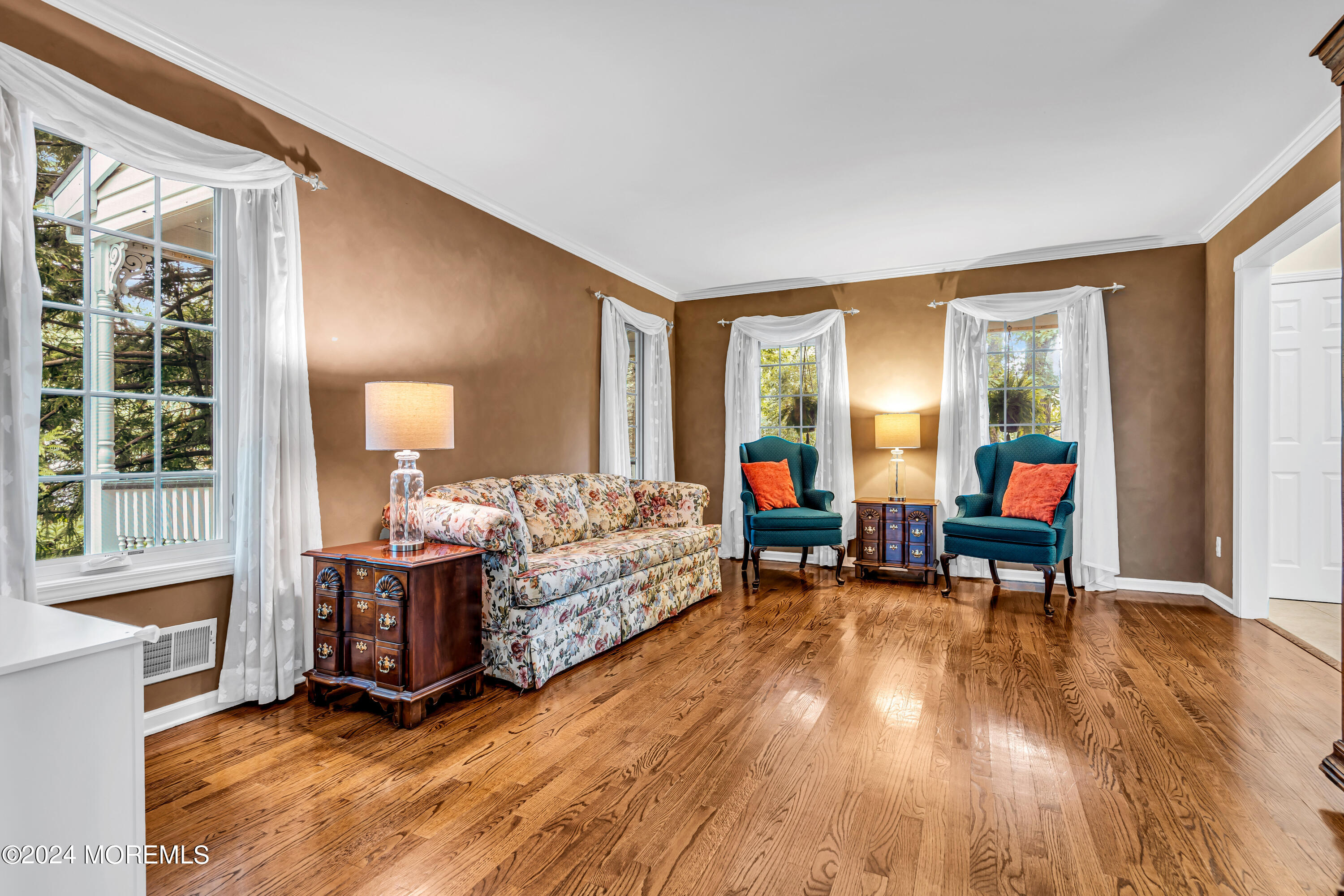 11 Dunhill Road Jackson, NJ 08527 - Photo 41 of 147 a living room with furniture and a wooden floor