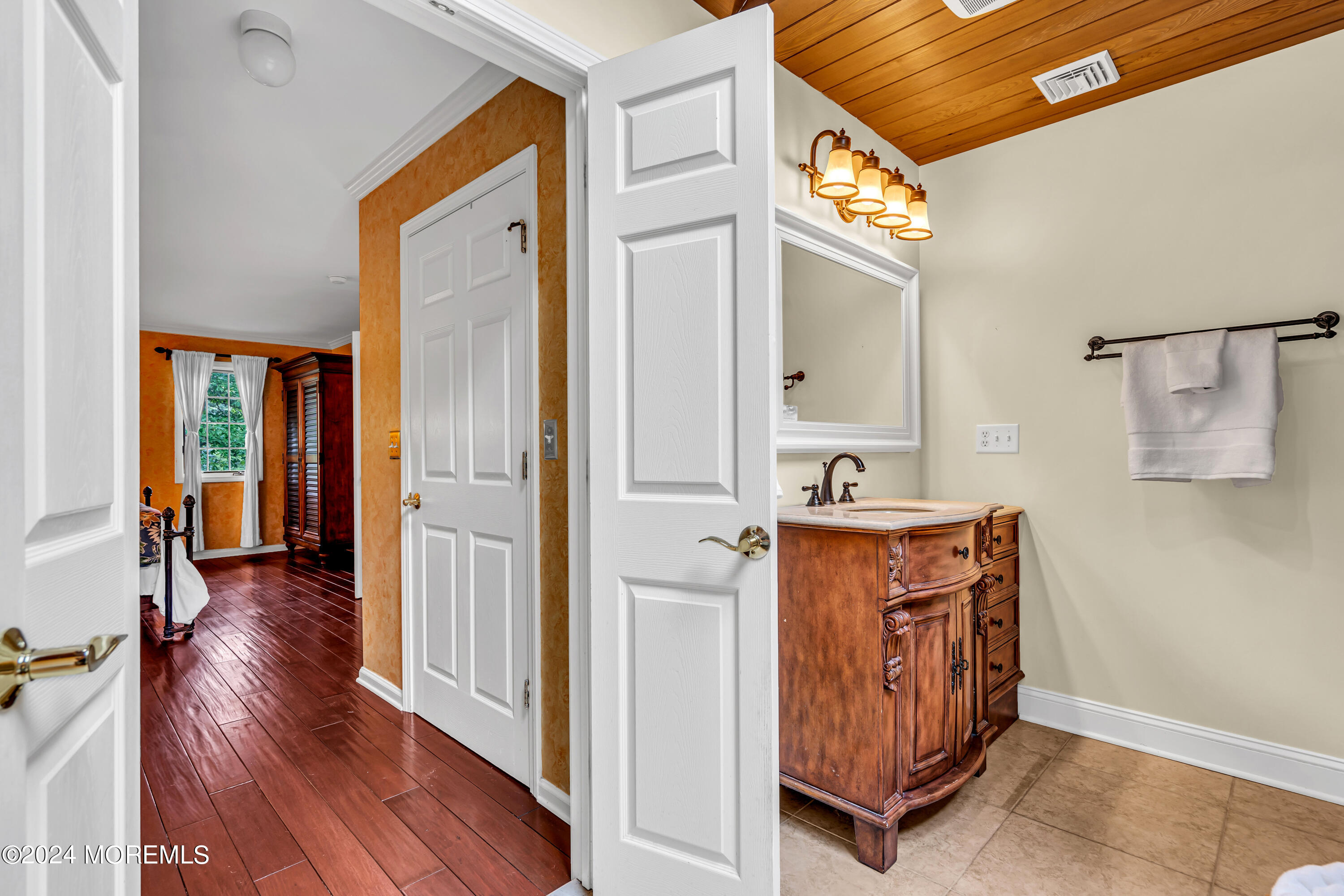 11 Dunhill Road Jackson, NJ 08527 - Photo 61 of 147 a view of front door with hallway and wooden floor